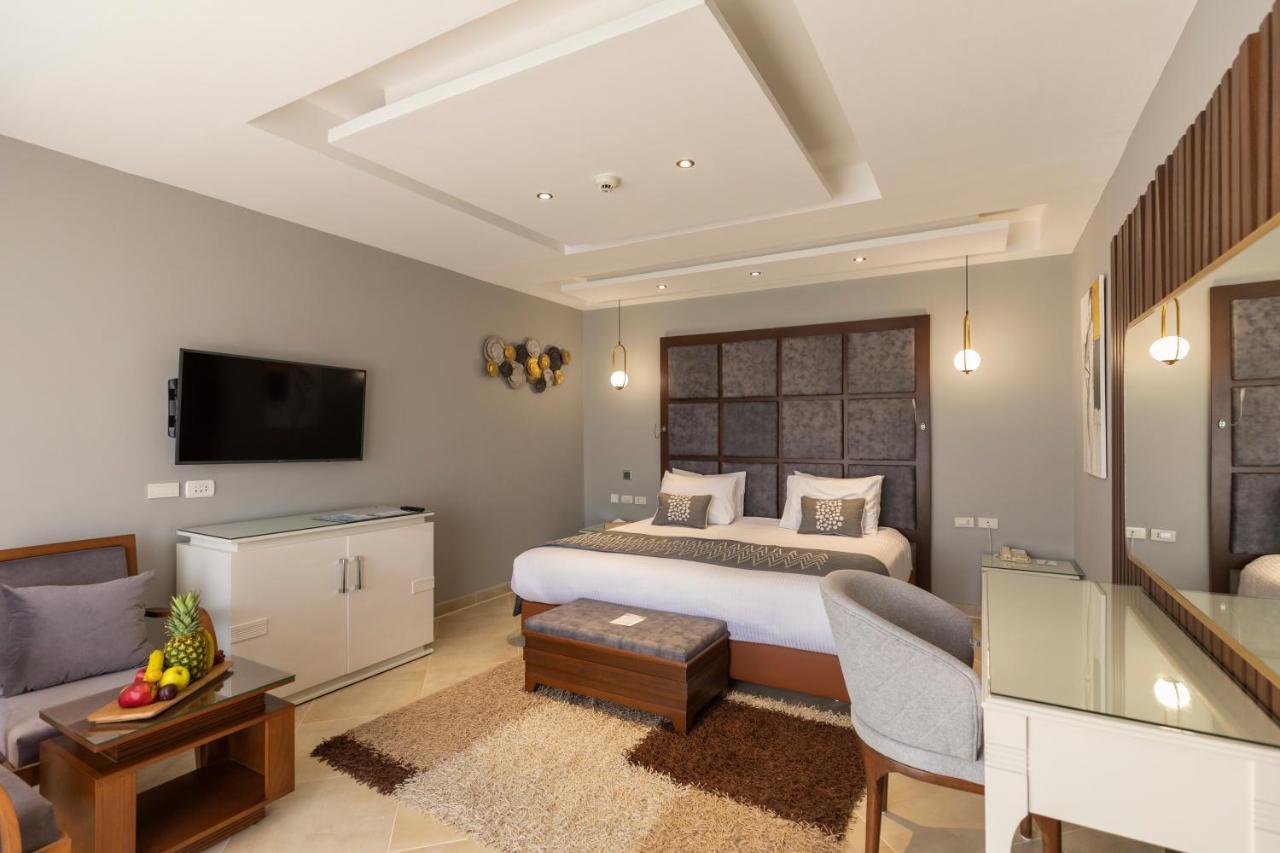 Sunrise Crystal Bay Resort -Grand Select (Adults Only) 후르가다 외부 사진 A bedroom at the hotel
